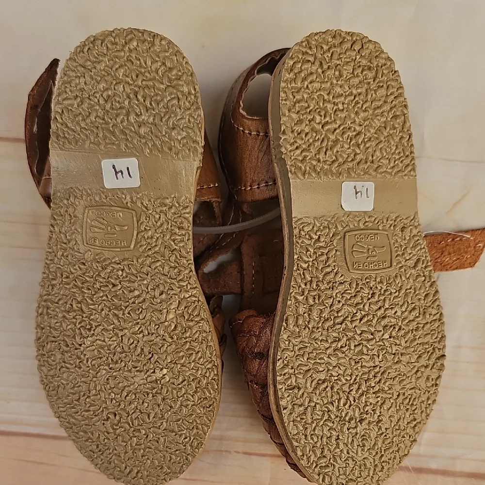 Brown and Red Moccasins with Beadwork and Fringe